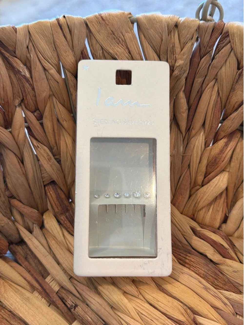 I am Sterling silver earrings three different sizes